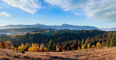 Morning slopes of the Carpathian Mountains (Yablunytsia village, Ivano-Frankivsk oblast, Ukraine). Autumn rural landscape.  - obrazy, fototapety, plakaty