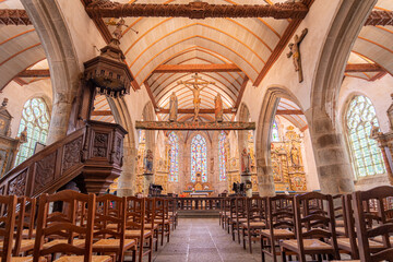 The Lampaul-Guimiliau Parish close (Enclos paroissial) is located at Lampaul-Guimiliau in the arrondissement of Morlaix in Brittany in north-western France - obrazy, fototapety, plakaty
