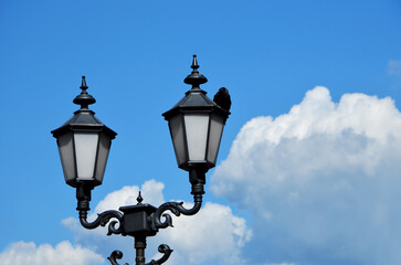 Fototapeta na wymiar beautiful street lanterns against the blue sky