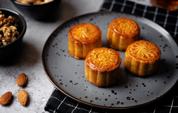 Moon cake with nuts in a plate