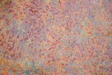 Rusty iron. The texture of the old rusty metal sheet. Closeup.