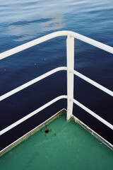 A metal railing of an old ferry on Lake Mjosa.