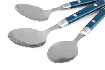 Stainless steel spoons with blue handles on white background