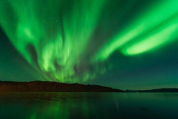 Northern Lights also known as Aurora Borealis over Scandinavia in Northern Norway - 653001472