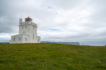Fototapeta na wymiar Dyrholaey Lighthouse in Iceland during the summer season