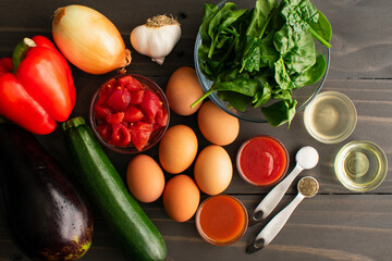 Ratatouille Brunch Skillet with Eggs and Spinach Ingredients: Summer vegetables, spinach, eggs, and...