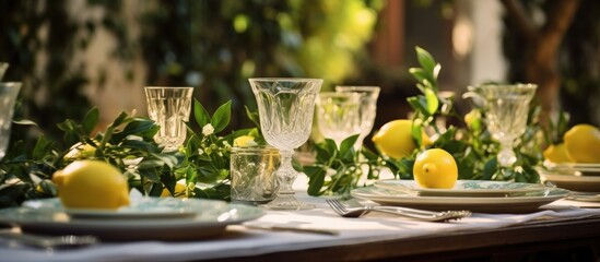 Italian wedding celebration in a rustic villa with lemon and herb decorations featuring a long festive table adorned with plates glasses and candles