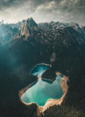 Aerial photos of lake with blue water - obrazy, fototapety, plakaty
