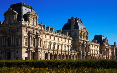 Fototapeta premium Majestic architecture of famous Louvre palace. View of building fragment from main entrance