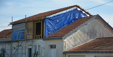Surélévation maison de toiture en tuiles	