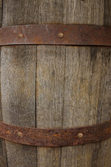 Traditional wooden barrel as background, closeup. Wine making