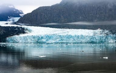 Beautiful layered blue ice of glacier in Glacier in Alaska.