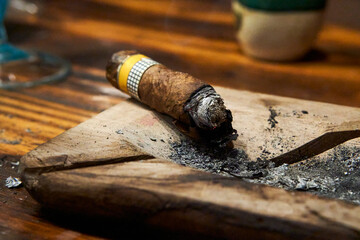Cuban cigar on rustic table