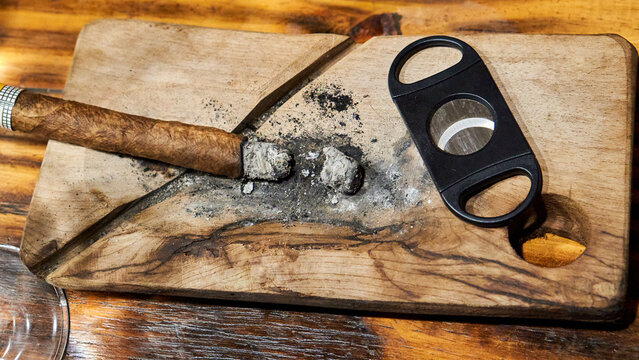 Cuban Cigar and Precision Cutter: Elegance in Simplicity