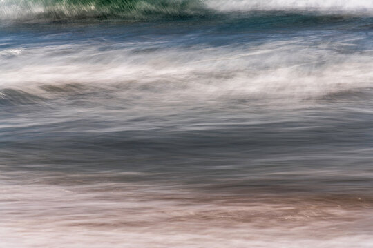 Long exposure of waves breaking on the beach at Jalama Beach in Lompoc, CA.
