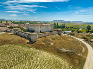 Aerial view of medieval Almenar castle near Soria Spain, four round towers protect the inner...