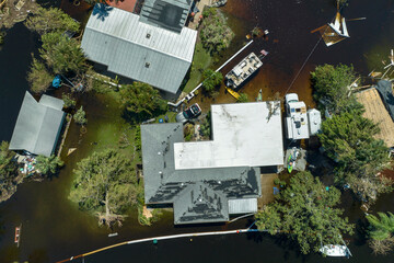 Heavy flood with high water surrounding residential houses after hurricane Ian rainfall in Florida...
