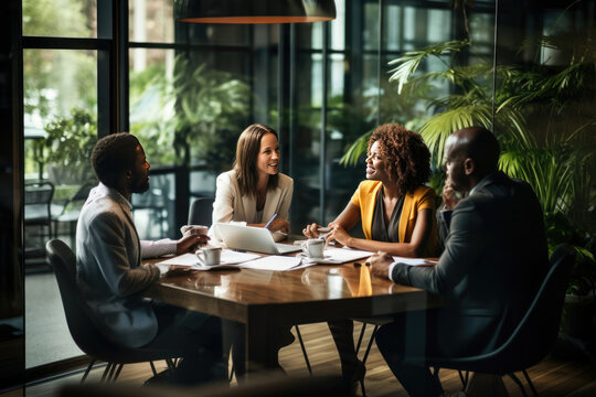 People engaged in conversation around a table