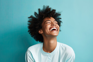 A woman captured in a moment of pure joy, laughter filling the air - obrazy, fototapety, plakaty