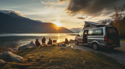 family camping car Go on holiday in a campervan, parked next to the river, with the mountains behind the sunset. - obrazy, fototapety, plakaty