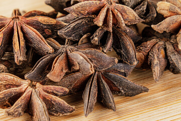 Close up of Star Anise Spices isolated on wooden background