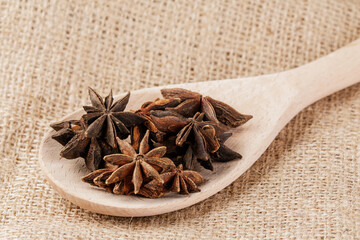 Close up of Star Anise Spices isolated on wooden background