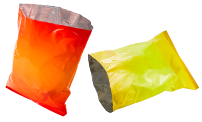 Empty Foil and plastic snack bags mockup isolated on white background, Yellow pillow packages for food production, snack wrappers on White Background PNG File.