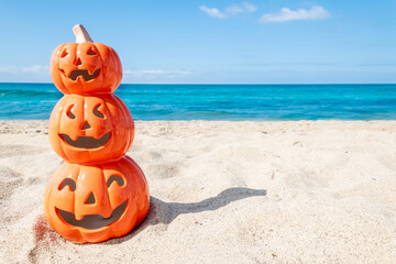 Halloween ocean background with three pumpkins - 653088837