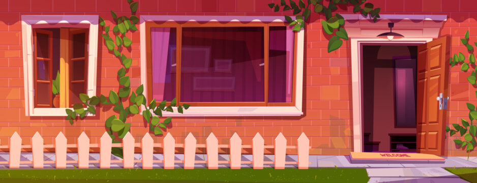 House facade with red brick wall, open door and windows. Vector cartoon illustration of home entrance with welcome mat on porch, nice white fence and green lawn outdoors, residential building interior