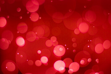 Abstract red bokeh background with soft blur bokeh light effect, background bokeh © Malee