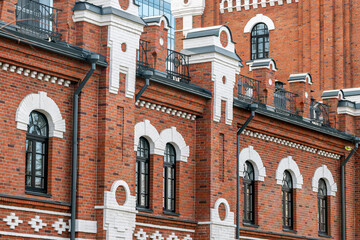 Fragment of the facade of a historic building on an autumn day