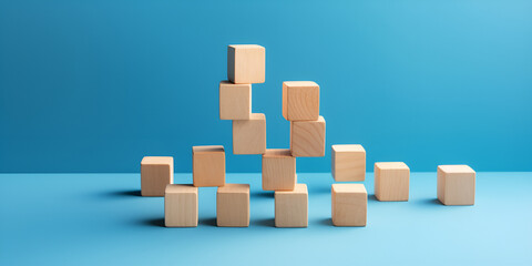 Toy wooden blocks on blue background front view