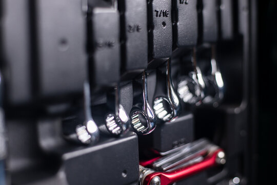 Tools box. Set of mechanical tools in the case. Car auto maintenance repair concept of chrome quality tool box with many tools made of steel screwdriver socket wrench spanner.