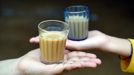 Two Glass of Fresh milk tea or Indian Kadak Chai on hand