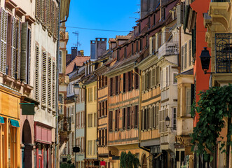 Fototapeta na wymiar Ornate traditional half timbered houses in the old town of Grande Ile, the historic center of Strasbourg, Alsace, France