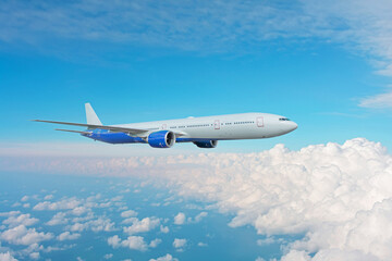Large passenger widebody jet airliner flies above the clouds while climbing.
