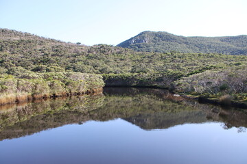 Obraz premium Reflections in Tidal River, Wilsons Promontory, Victoria, Australia.