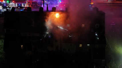Aerial Drone View of Fire Apparatus on Scene of House Fire
