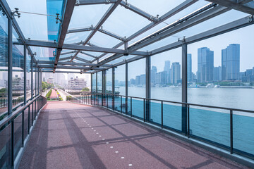 financial buildings of Shanghai and beautiful bridge by the river