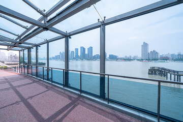 financial buildings of Shanghai and beautiful bridge by the river