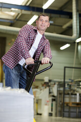 happy worker in a warehouse