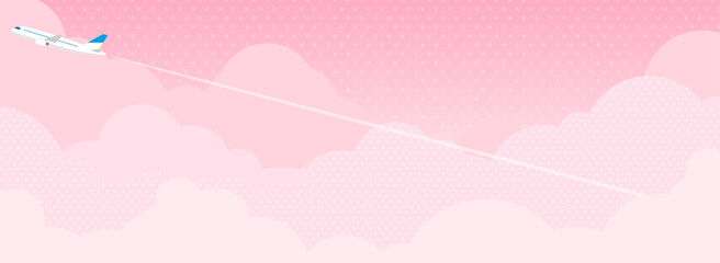 飛行機とピンク色の雲・空　背景素材（バナー向け横長）