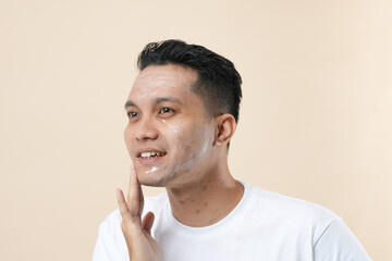 Photo of a young Asian man face healthy skin and natural skincare.