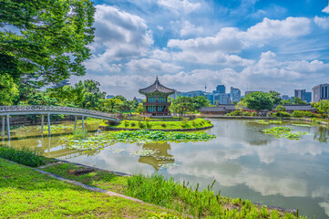 View of the water hall Hyangwonjeong with pool
Green in the palace. View of Gyeongbokgung Palace in...