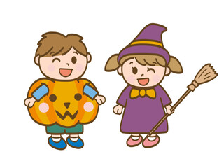 ハロウィンのカボチャと魔女に仮装する男の子と女の子_保育園児の兄妹