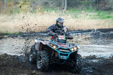 ATV, buggy, quad and UTV offroad vehicle rally in dust with mud splash. Extreme, adrenalin. 4x4