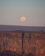 moonrise over desert landcape