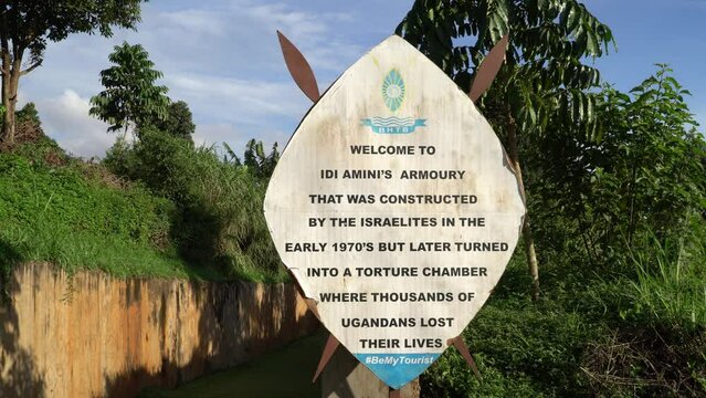 Sign at entrance to Kampala bunker where leader Idi Amin sent political opponents to die, Uganda in Africa
