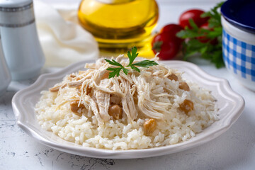 Traditional delicious Turkish food; Rice with chickpeas and chicken (Turkish name; Tavuklu nohutlu pilav or pilaf)