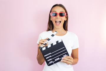 video recording influencer woman holding clapboard film action concept director scene action cinema...